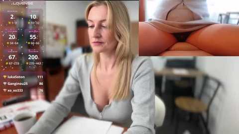 Media: Video of a blonde Caucasian woman in a gray V-neck top, seated at a desk in a classroom. Inset shows her wearing a beige thong, revealing her buttocks. Background shows blurred classroom with wooden furniture and colorful posters.