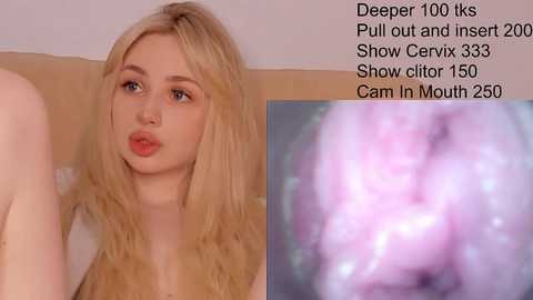 Media: A video of a young Caucasian woman with long blonde hair and fair skin, wearing a white top, sitting on a beige couch. She has a slightly pouty expression. The image also includes a close-up of her cervix, showing pink tissue.