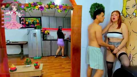 Media: Video: A young Asian man, shirtless, wearing light blue shorts, and a woman in a white bra and black stockings, engaged in a sexual act in a colorful, cartoon-themed room.