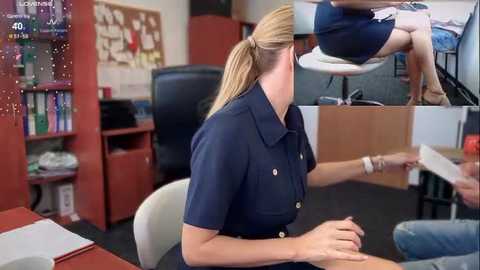 Media: A video of a blonde woman in a navy blue police uniform sitting at a desk, with a mirror showing her from behind. Office background includes bookshelves and a bulletin board.