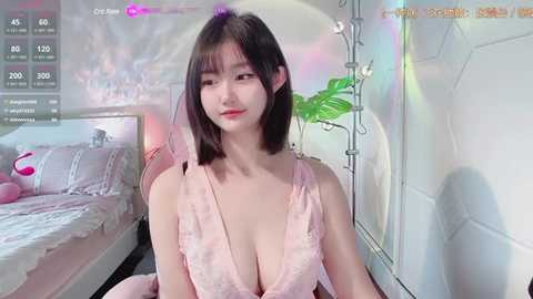 Media: Video of an East Asian woman with straight black hair and a pink lace dress, sitting in a pastel-themed bedroom with a bed, potted plant, and digital overlay of \"City Day\" statistics.