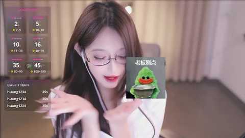 Media: A video of a fair-skinned woman with long brown hair, wearing glasses, and a white blouse, smiling while looking at a smartphone, with a virtual green frog character overlaid.