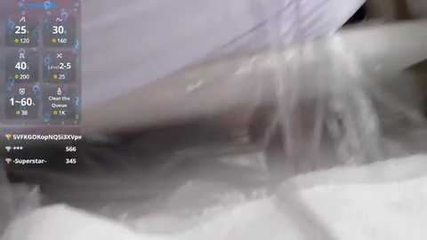 Media: Video of a white, wet, foamy substance spilling over a surface, with a digital overlay showing temperature and humidity readings.