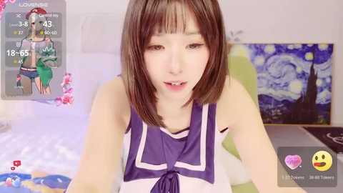 Media: A video of an Asian woman with straight brown hair and fair skin, wearing a purple and white sleeveless top, smiling while playing a virtual reality game in a bedroom with a Starry Night painting in the background.