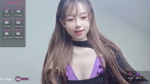 Media: Video of a young East Asian woman with long brown hair, fair skin, and a purple bra, wearing a black choker and a black top, set against a neutral background.