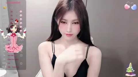 Media: Video of an Asian woman with long black hair, pale skin, and a slim figure, wearing a black sleeveless dress, posing seductively in a bathroom with a mirror.