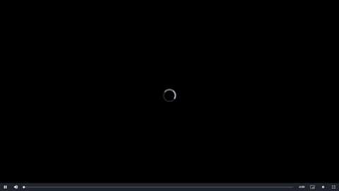 Media: A digital video of a dark, black background with a small, circular, white light at the center, resembling a glowing orb. The image has a minimalist, abstract aesthetic with no visible objects or textures, emphasizing the stark contrast between light and dark.