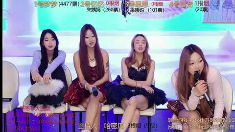 Media: Video of four East Asian women in a studio, each holding a microphone, seated on white chairs, smiling, wearing various outfits, with a colorful background and Chinese text.