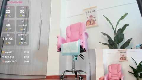 Media: Video of a bright, modern room with a pink leather office chair, a tall potted plant, and a calendar displaying dates and appointments.