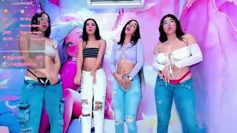 Media: Video of four Asian women with long hair, wearing revealing outfits, standing in a vibrant, pastel-colored room with a unicorn mural, engaging in live stream.