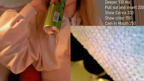 Video of a person in a beige sweater holding a green can of Carlsberg beer, highlighting deep throat techniques and pull-out-and-insert methods.