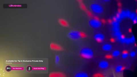 Media: Video of a blurred, vibrant light display with red and blue patterns against a dark background. Text at the bottom reads, \"In Private Only.\