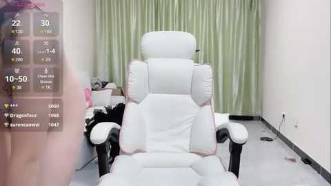 Media: A video of a modern white gaming chair in a minimalist room with beige curtains and a gray floor, with a virtual camera overlay showing 10-50fps and 720p resolution.