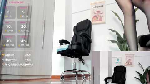 Media: Video of an ergonomic office chair with a blue cushion on a shiny wooden floor, surrounded by a white wall with a calendar and a plant.