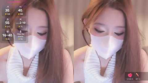 Media: Video of an Asian woman with long, straight brown hair, wearing a white face mask and a white sleeveless top, in a soft-focus bedroom setting.