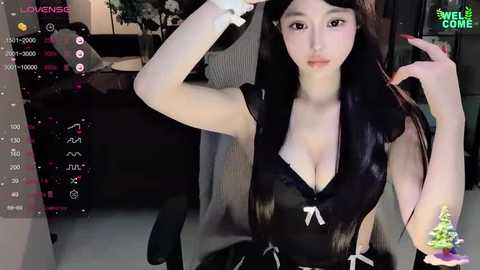 Media: A high-resolution screenshot of a virtual reality video featuring an East Asian woman with long black hair in a revealing black maid outfit, with a digital Christmas tree in the background.