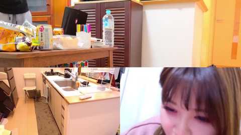 Media: Video collage: top - cluttered kitchen with wooden cabinets, sink, and countertops; bottom left - close-up of messy sink; bottom right - close-up of woman with short brown hair, blurry.