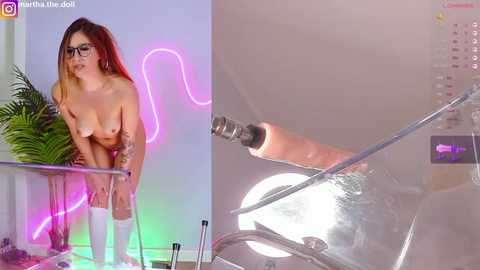 Media: A video of a topless, tattooed woman with glasses and long, red hair, leaning over a glass table, illuminated by colorful neon lights.