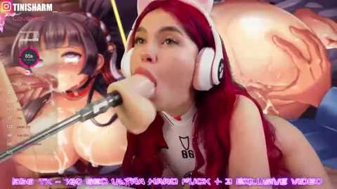 Media: A digitally manipulated image of a young Asian woman with red hair, wearing a headset, performing oral sex on a large, erect penis.