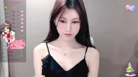 Media: Video of a pale-skinned, slender East Asian woman with long black hair and large eyes in a black satin camisole, set against a gray background.