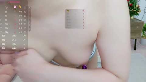 Media: A video of a light-skinned woman in a blue thong, holding a purple vibrator, her breasts partially visible, with a calendar overlay showing May 31st.