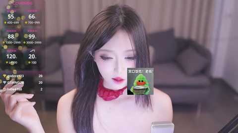 Media: A video of a fair-skinned, long-haired Asian woman wearing a red choker and holding a phone, overlaid with virtual filters, including a green frog and a red lipstick.