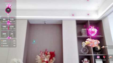 Media: A video of a modern, minimalist room featuring a pink heart-shaped light, white shelves, and floral arrangements. The image includes a digital overlay with fitness stats.