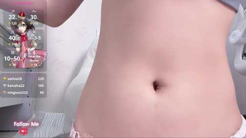 Media: Video of a close-up of a light-skinned person's bare midsection, featuring a navel and a hint of a pink bra. The background shows a virtual reality interface with a virtual character in a pink dress.