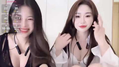 Media: Video of an East Asian woman with long, straight brown hair, wearing a white blouse, red lipstick, and black headphones. She smiles, posing indoors with a soft-focus background.