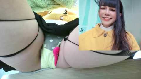 Media: A close-up photo collage featuring a smiling East Asian woman with long black hair in a yellow coat, and a cropped image of her in black lingerie with a pink thong.