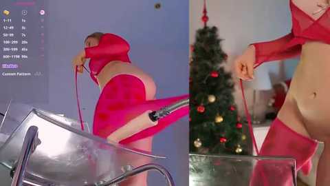 Media: Video of a woman in a red, sheer, hooded dress, lifting her skirt to reveal red underwear. She stands in front of a decorated Christmas tree, with a blurred background.