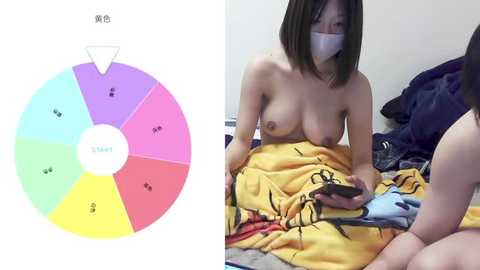 Media: Video of an Asian woman with short brown hair, topless, wearing a face mask, lying on a bed, holding a smartphone, surrounded by colorful pillows.