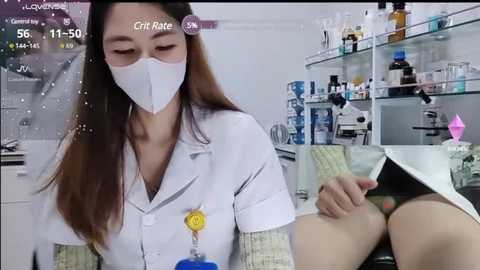 A video shows an Asian woman in a lab coat, mask, and glasses, examining a man's black underwear, with a microscope in the background.