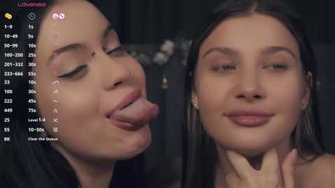 Media: Video of two women with light skin, long dark hair, and full lips, making kissing faces; digital overlay showing age, location, and other social media info.