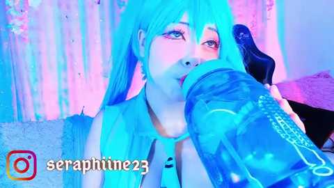 Media: A vibrant, CGI image of a woman with turquoise hair, wearing a sleeveless top, licking a large, clear dildo. The background is neon-lit with pastel hues. Watermark: \"seraphine_23\