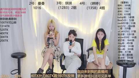 Media: Video of three young women seated on a stage, with one in a floral dress, one in a white top, and one in a yellow top. Text overlay lists their social media stats.