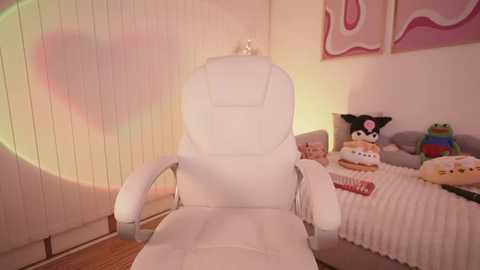 Video of a white leather office chair facing a pink wall with a heart-shaped shadow, a plush bed with a fluffy blanket, and cartoon-themed pillows.