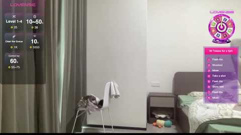 Media: Video of a modern, minimalist bedroom with white walls, a bed, and a standing fan. A \"Love Meter\" simulation displays on a screen, showing a high score.