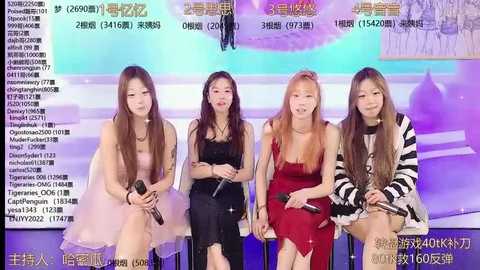 Media: Video of four Asian women in different outfits, sitting on a stage, holding microphones, with a blurred background featuring Chinese text and graphics.