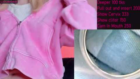 Media: Video of a woman in a pink hoodie with a white sweater underneath, showing her chest and torso. Text overlays in pink explain how to put out and insert a show cutter.