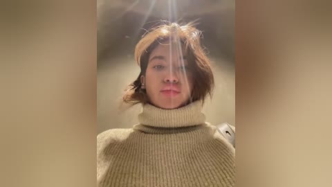 Media: A close-up video of a young woman with shoulder-length brown hair, wearing a cream-colored turtleneck sweater, captured through a lens flare effect, creating a surreal and dramatic atmosphere.