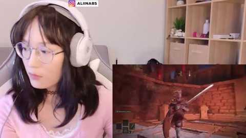 Media: A video collage: left, a young Asian woman with glasses, wearing white headphones, right, a medieval-style video game scene.