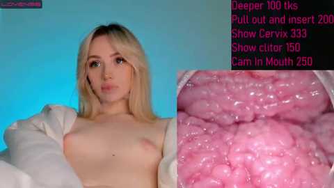 Media: Video of a topless blonde woman with medium-sized breasts, showing her cervix in a close-up, with a digital screen displaying live cam stats in the background.