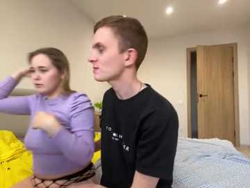 Media: A video of two young people in a bedroom; a woman in a lavender shirt, and a man in a black t-shirt, both looking confused.