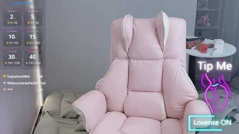 Media: A video of a pink, tufted leather recliner in a modern, minimalist bedroom, with a \"Tip Me\" overlay and social media icons.