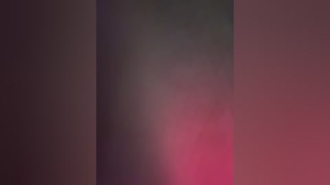 A blurred, abstract digital artwork with soft, shifting hues of pink, purple, and green, creating a dreamy, ethereal atmosphere with no discernible objects or figures.