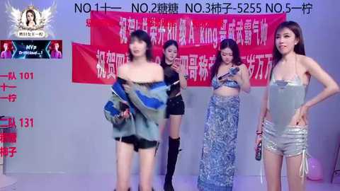 Video of five Asian women in various stylish outfits, including off-shoulder tops, shorts, and long skirts, posing against a red banner with Chinese text. Background is white, with a red digital display showing their numbers.