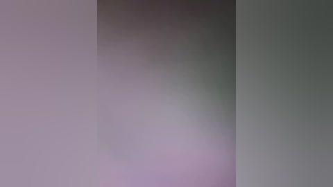 A blurred video featuring a soft gradient from light purple to gray, creating a sense of depth and movement. The image lacks distinct objects or identifiable features, emphasizing a smooth, abstract aesthetic.