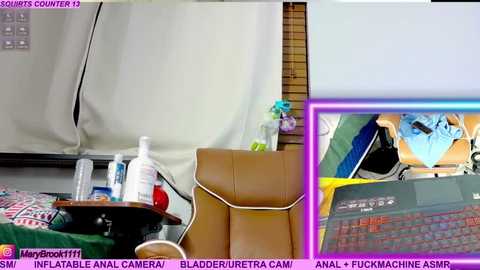 Video of a messy office with a whiteboard, a leather chair, and a desk cluttered with papers, bottles, and a computer screen displaying a pornographic video.