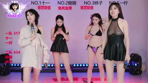 Video of four Asian women in revealing black leather bikinis, standing on stage with a microphone, against a purple and white backdrop with red text.